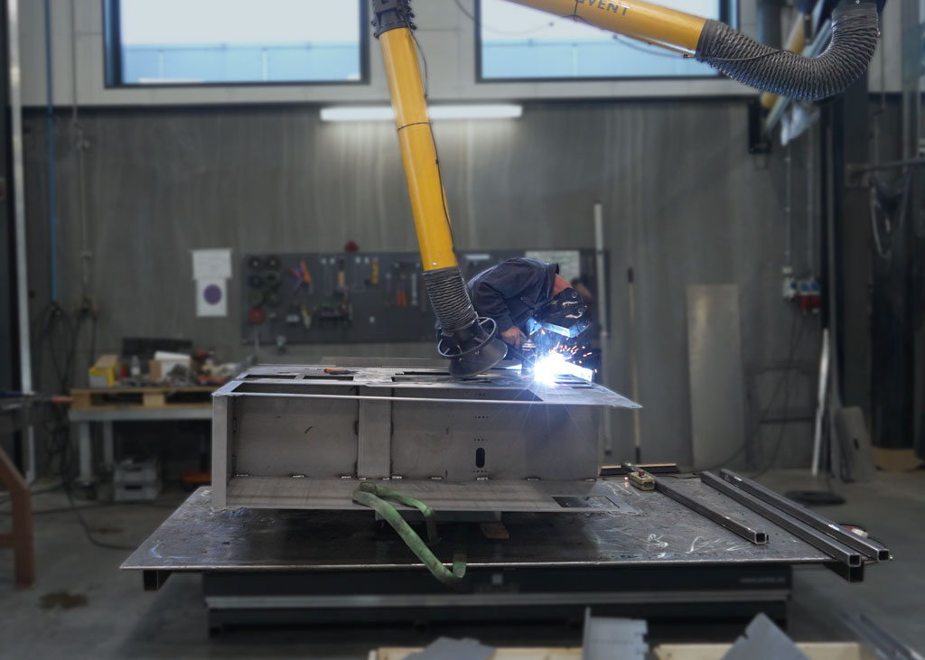 A demonstration of welding in a workshop without using a welding cobot