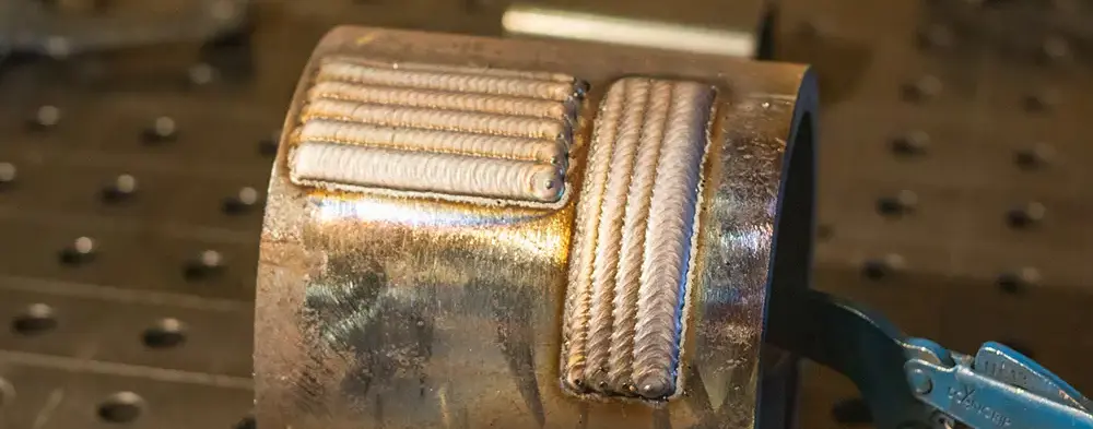Cladding Explained: Understanding Its Role and Applications 1 Examples of cladding done with a cobot