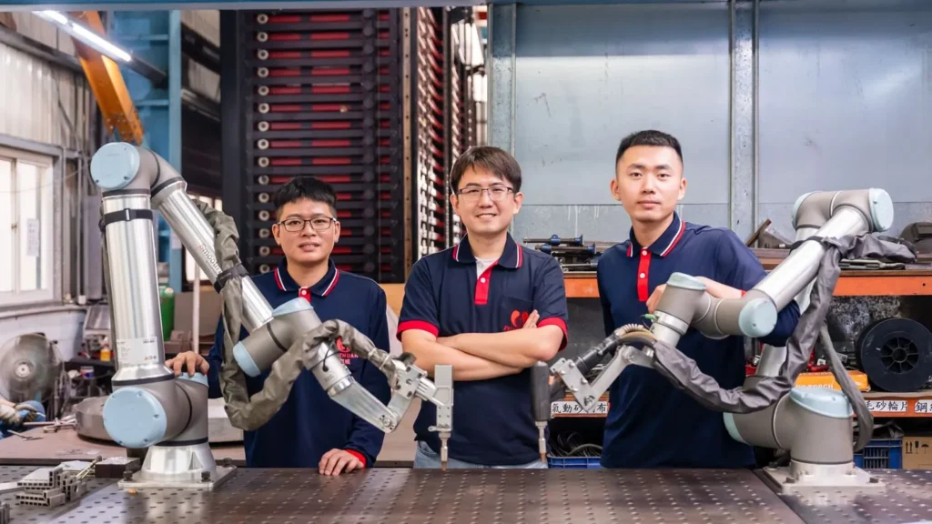 Fu Zhuan Steel Accelerates High-Mix Laser Welding with SmoothTool and UR12e cobot 2 Fu Zhuan Employees and the Laser Welding solution with SmoothTool and UR12e