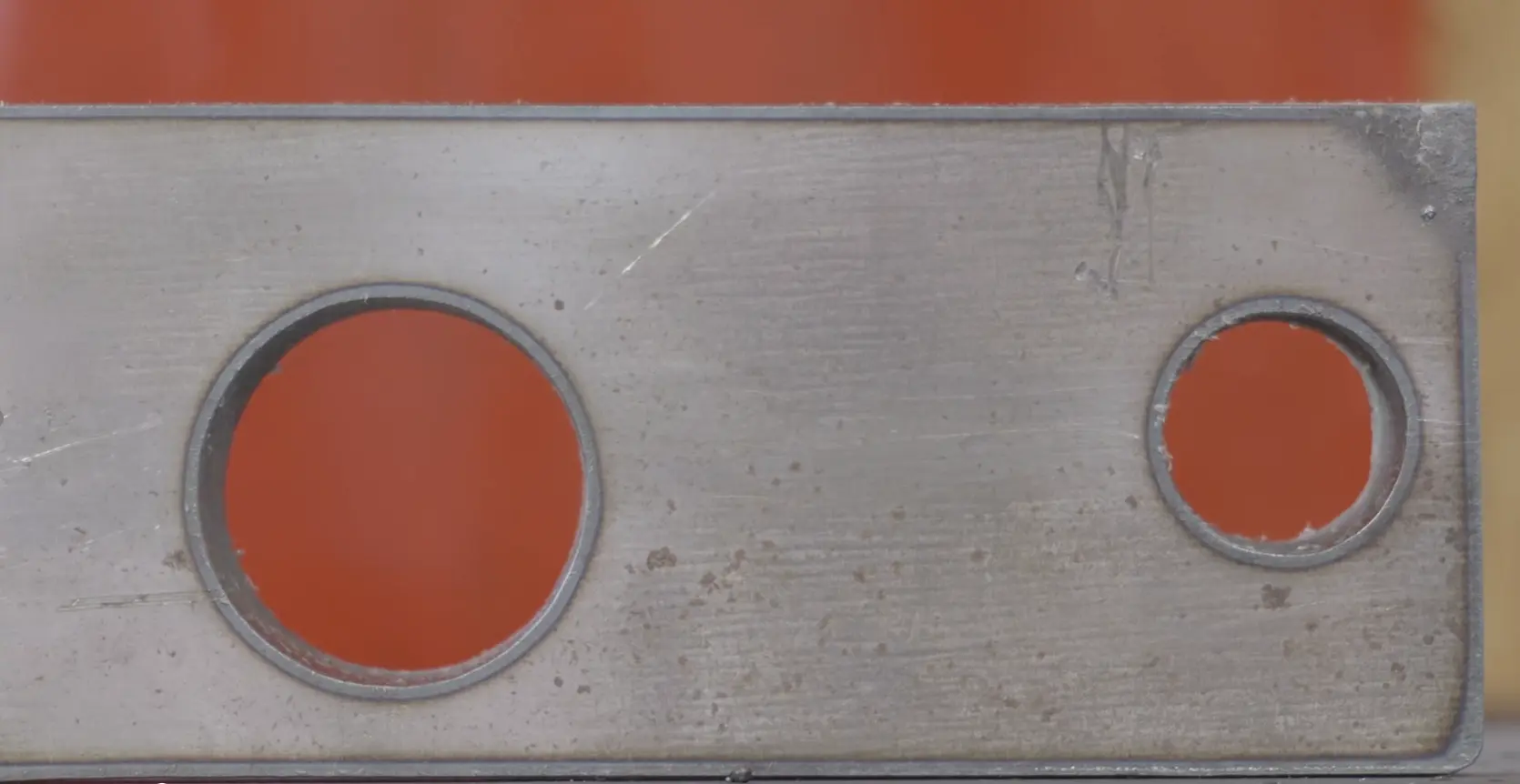Combination of circular and rectangular cuts performed on flat plate with SmoothCut